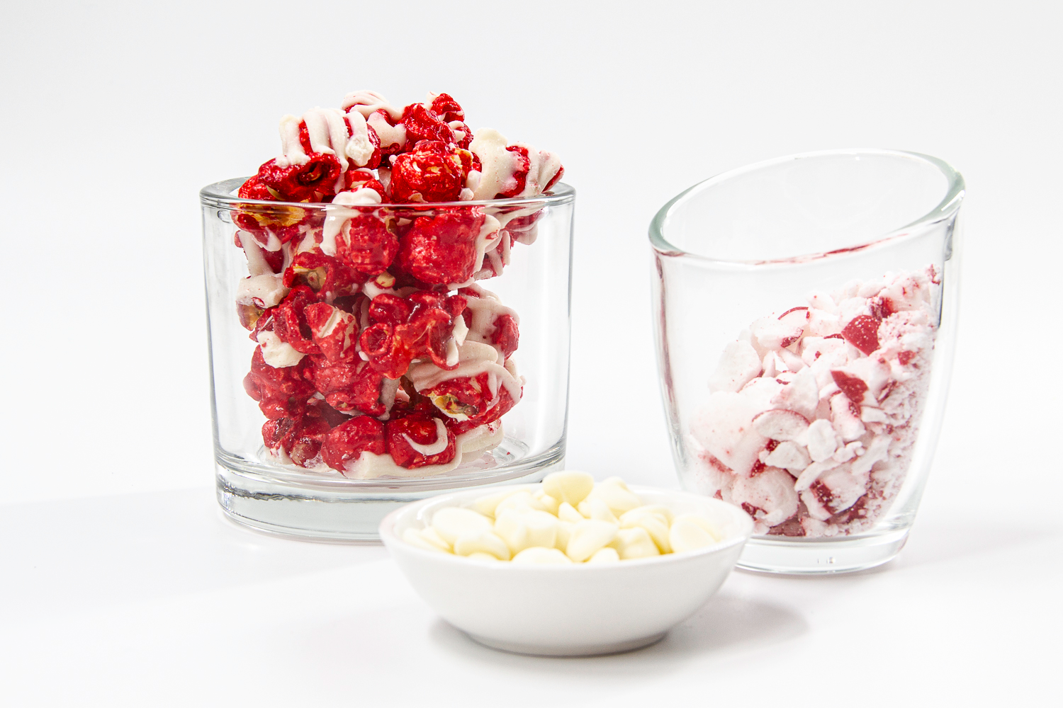 All Christmas Tins now half-off! Buy Our Seasonal Peppermint Bark Popcorn covered in Creamy White Chocolate. All Christmas Tins are Beautifully Crafted with Holiday Scenes.