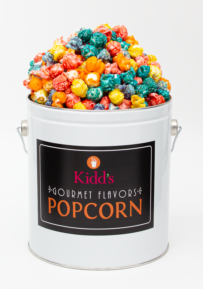 Rainbow popcorn in shippable 1 gallon white and black label signature Kidd's Pop Shop Popcorn Tin. Rainbow Corn Colors of Orange, Purple, Blue, Yellow and pink mixed together in a tin.