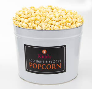 Top Rated specialty gourmet popcorn flavor in Garlic Parmesan presented in our deliverable 2 gallon White and Black Pop Corn Tin