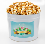 Load image into Gallery viewer, Happy Easter Medium Gourmet Popcorn tin filled with Classic Caramel Popcorn and Savory, White Cheddar. Perfect for Easter Baskets.
