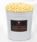 Load image into Gallery viewer, Small Batch, Made-in-House Garlic Parmesan Flavored Popcorn in a large 3.5 gallon White and Black Label Popcorn Tin Canister.
