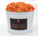 Load image into Gallery viewer, Signature White and Black 2 gallon Popcorn tin filled with RedHots Cinnamon and  tasty caramel popcorn. Buy during our Holiday sale for half off

