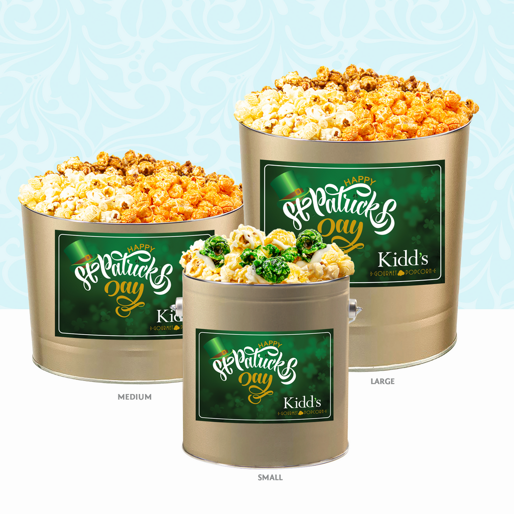 St. Patrick's day Gold tins in 1 gallon, 2 gallon and 3.5 gallon with Gourmet Popcorn in Caramel, Cheese, White cheddar and seasonal Butterscotch with white chocolate drizzle.