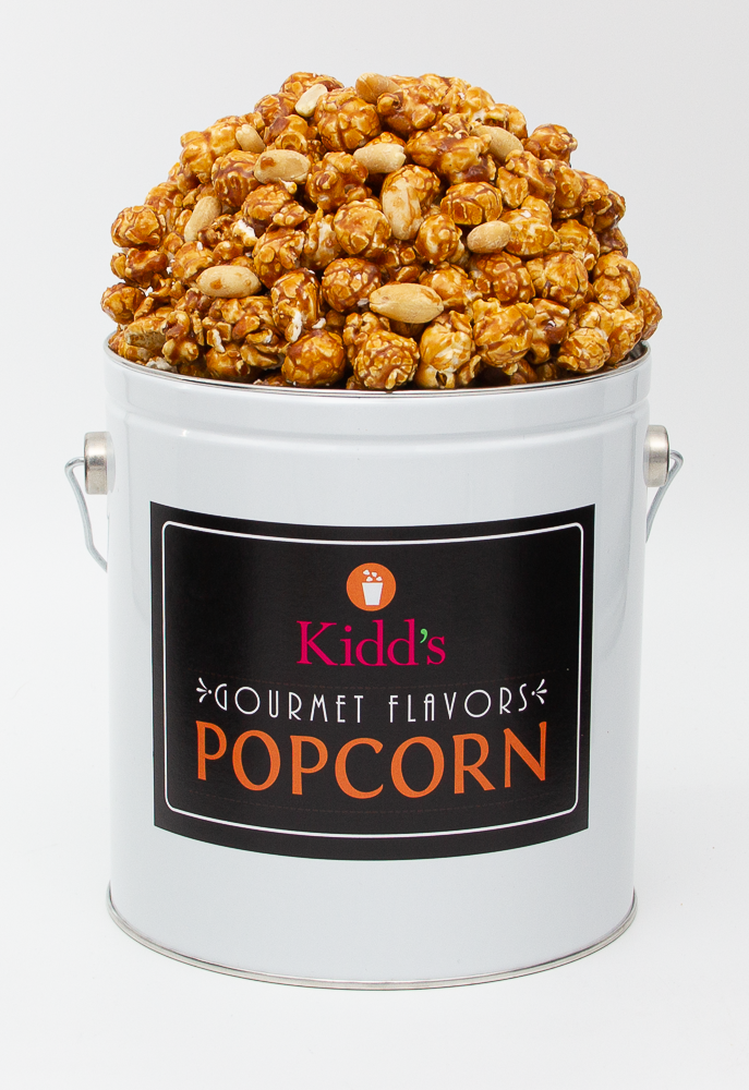 Kidd's Pop Shop popcorn brand version of Cracker Jacks  - fresh caramel corn and salty peanuts. Served in a 1 gallon white tin.