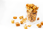 Load image into Gallery viewer, Tasty Caramel Corn in clear cup with soft, chewy caramel candy pieces
