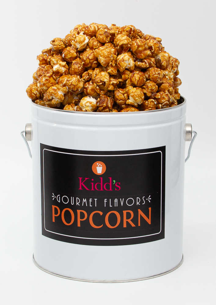 Delicious and mouthwatering caramel corn in signature 1 gallon reuseable white with black label popcorn tin.