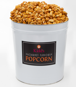 Load image into Gallery viewer, Kidd&#39;s Pop Shop Popcorn Brand large white gift tin is filled with 58 cups of Cracker Jacks style popcorn. Our award winning Caramel Popcorn with nuts is the perfect salty and sweet snack.
