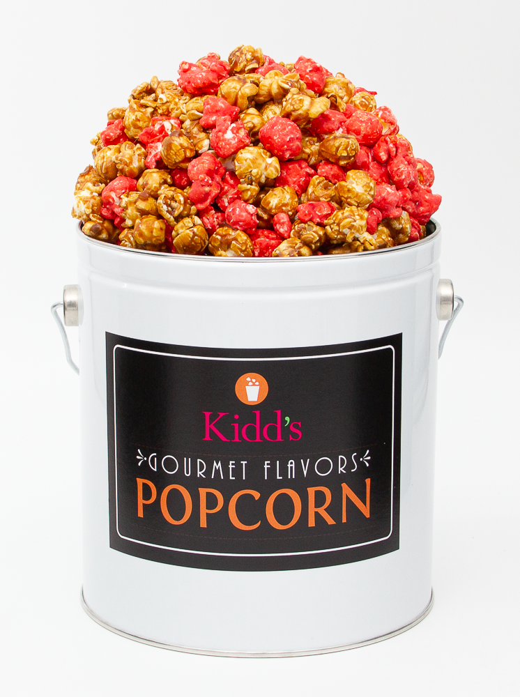 Spicy RedHots Cinnamon Popcorn paired with specialty caramel gourmet popcorn in small 1 gallon white tin with black lable