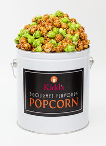 Our small white with black label gourmet gift tin filled with indulgent caramel apple gourmet popcorn. Holiday Sale tins are reduced price at fifty percent off.