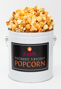 Three flavor one gallon popcorn tin sold in our most popular gourmet popcorn flavors. Flavorful Cheese, Tasty White Cheddar and the best caramel popcorn. It's a fancy food gift in a resealable, reusable tin.