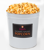 Load image into Gallery viewer, Award winning caramel popcorn mixed with cheddar cheese and white cheddar flavors make the best gift for any occasion. Flavors come mixed together in a large classic white and black 3.5 gallon tin now selling for 50% off
